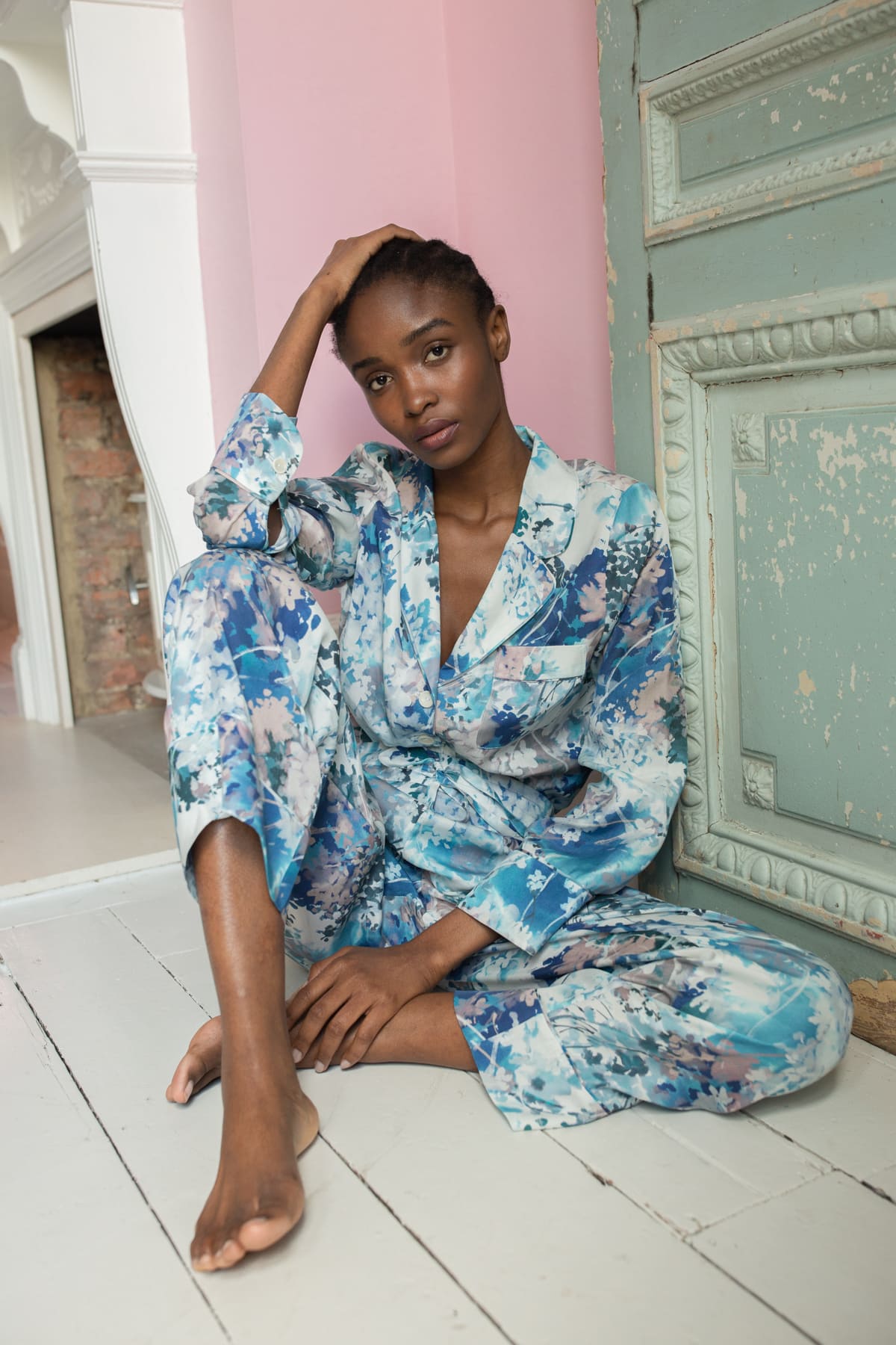 Ephemeral Bloom Luxury Pyjamas - Sitting in living room - Orchard Moon - Sustainable Luxury Loungewear